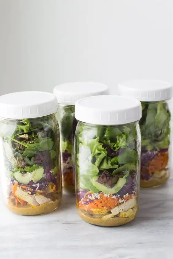 Thai Chicken & Sweet Potato Mason Jar Salads! Easy, delicious and prep for meal prep for the week. #mealprep #glutenfreelunches #masonjarsalads