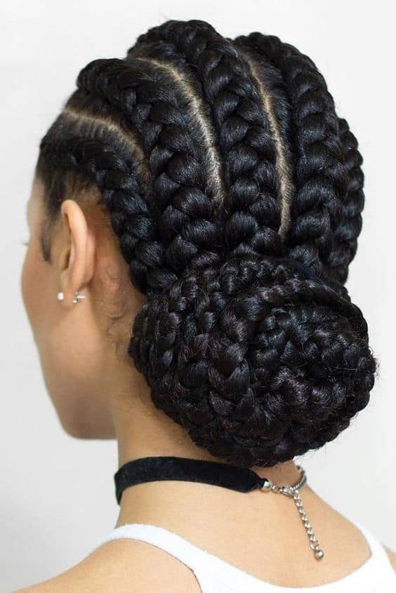 Jumbo cornrow braids and bun.