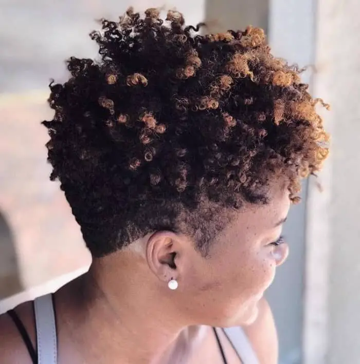 Keep your natural hairstyle short but add highlights to make it pop a little. 