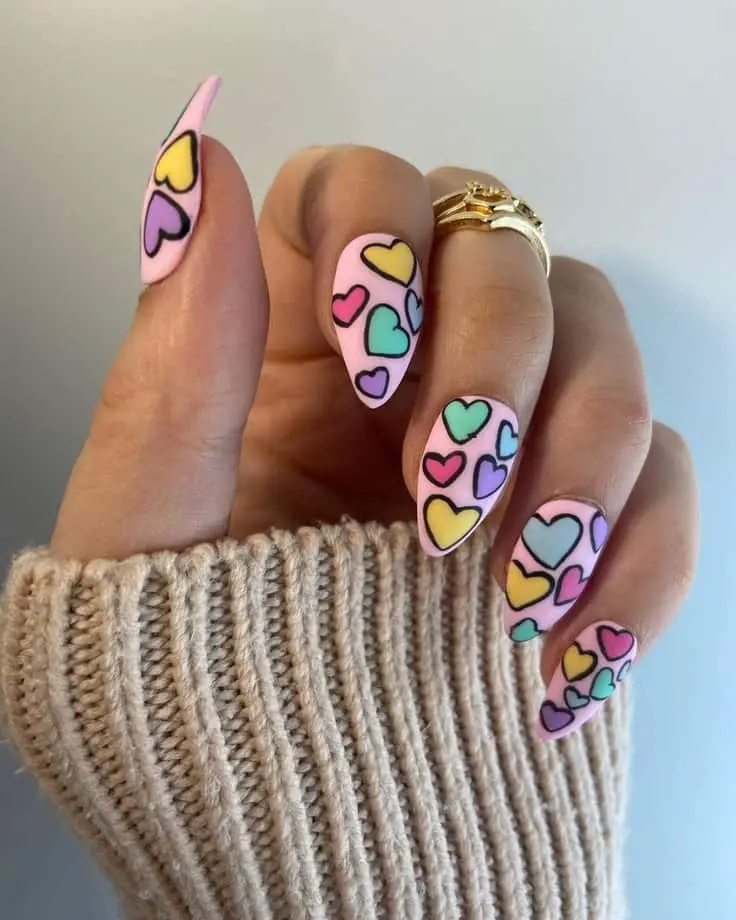 Colourful heart nail designs. 21 Cute Valentine’s Day Nail Design Ideas to Shine The most romantic day of the year is approaching. Yes, we are talking about Valentine’s day. Apart from all these sweet and meticulous dressing, valentine’s day nail art is essential. 